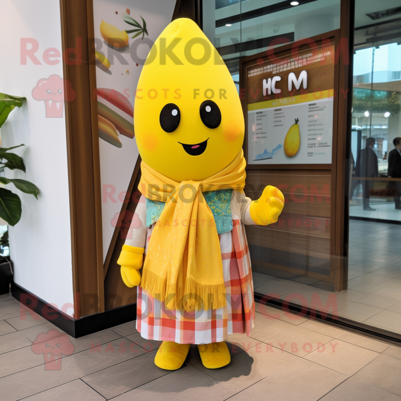 Yellow Mango mascot costume character dressed with a Dress Pants and Scarves