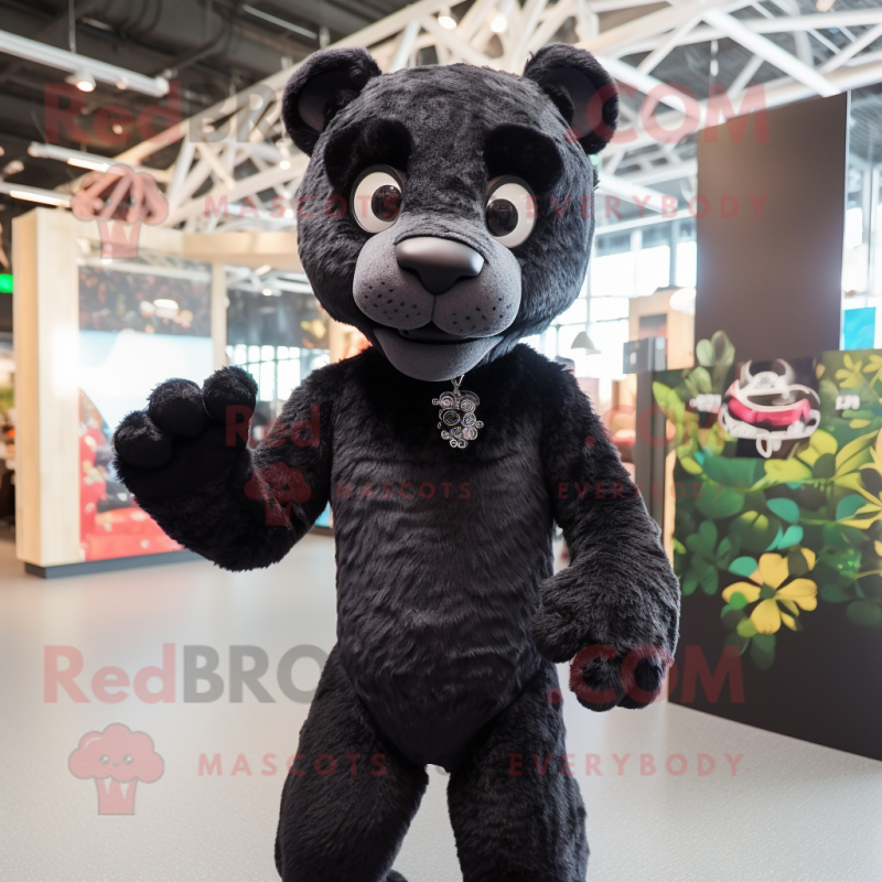 Black Leopard mascot costume character dressed with a Playsuit and Suspenders Black Leopard mascot costume character dressed with a Playsuit and Suspenders
