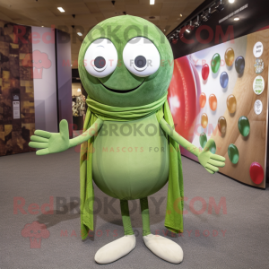 Olive Juggle mascot costume character dressed with a Skinny Jeans and Shawl pins