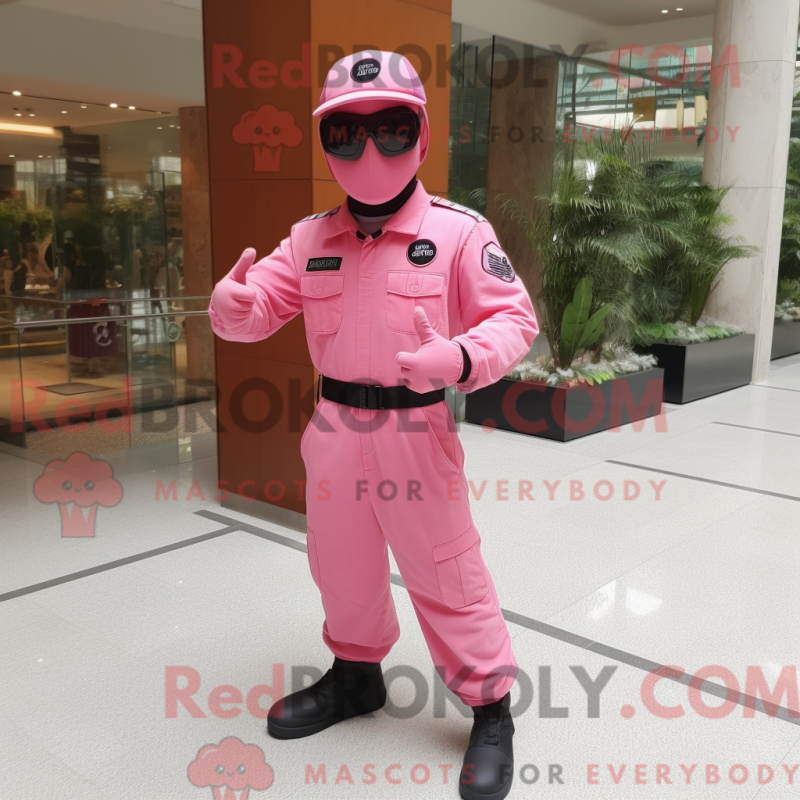 Pink Para Commando mascot costume character dressed with a Dress Pants and Sunglasses Mascot Costumes Redbrokoly Sizes L 175 180CM