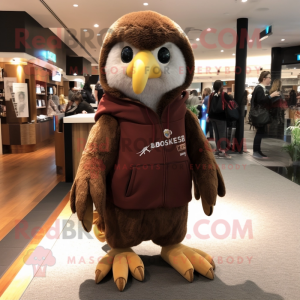 Brown Haast'S Eagle mascot costume character dressed with a Hoodie and Keychains