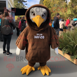 Brown Haast'S Eagle mascot costume character dressed with a Hoodie and Keychains