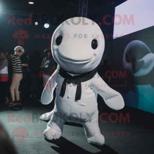 Black Beluga Whale mascot costume character dressed with a Playsuit and Tie pins