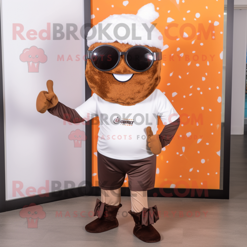 Rust Cupcake mascot costume character dressed with a Leggings and Sunglasses Rust Cupcake mascot costume character dressed with a Leggings and Sunglasses