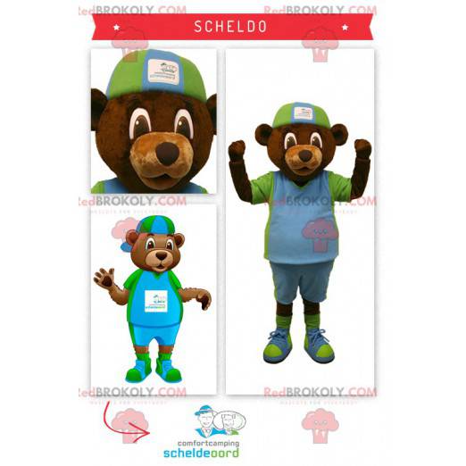 Brown bear mascot in green and blue outfit - Redbrokoly.com