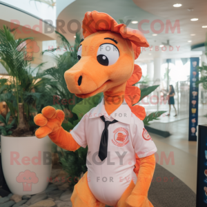 Peach Sea Horse mascot costume character dressed with a Polo Shirt and Tie pins