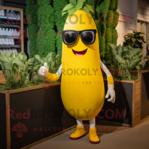 Yellow Beet mascot costume character dressed with a Tank Top and Sunglasses