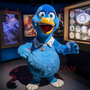 Blue Dodo Bird mascot costume character dressed with a Henley Shirt and Bracelet watches