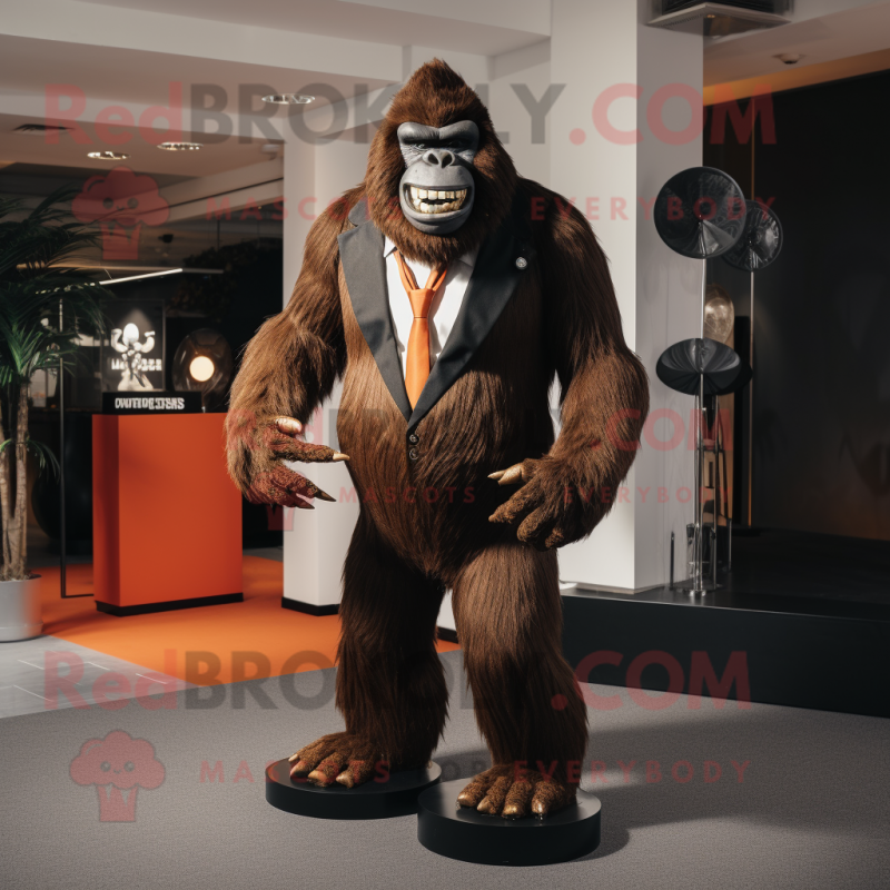 Rust Gorilla mascot costume character dressed with a Tuxedo and Shoe clips Rust Gorilla mascot costume character dressed with a Tuxedo and Shoe clips