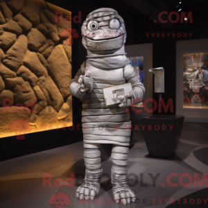 Silver Mummy mascot costume...
