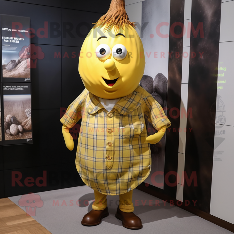 Yellow Onion mascot costume character dressed with a Flannel Shirt and Cufflinks