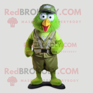 Lime Green Kiwi mascot costume character dressed with a Cargo Shorts and Cummerbunds