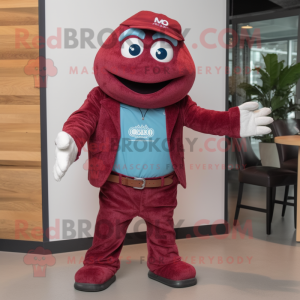 Maroon Cod mascot costume character dressed with a Flare Jeans and Tie pins