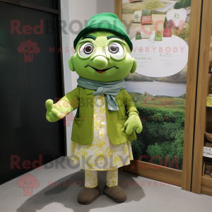 Green Apricot mascot costume character dressed with a Oxford Shirt and Shawls