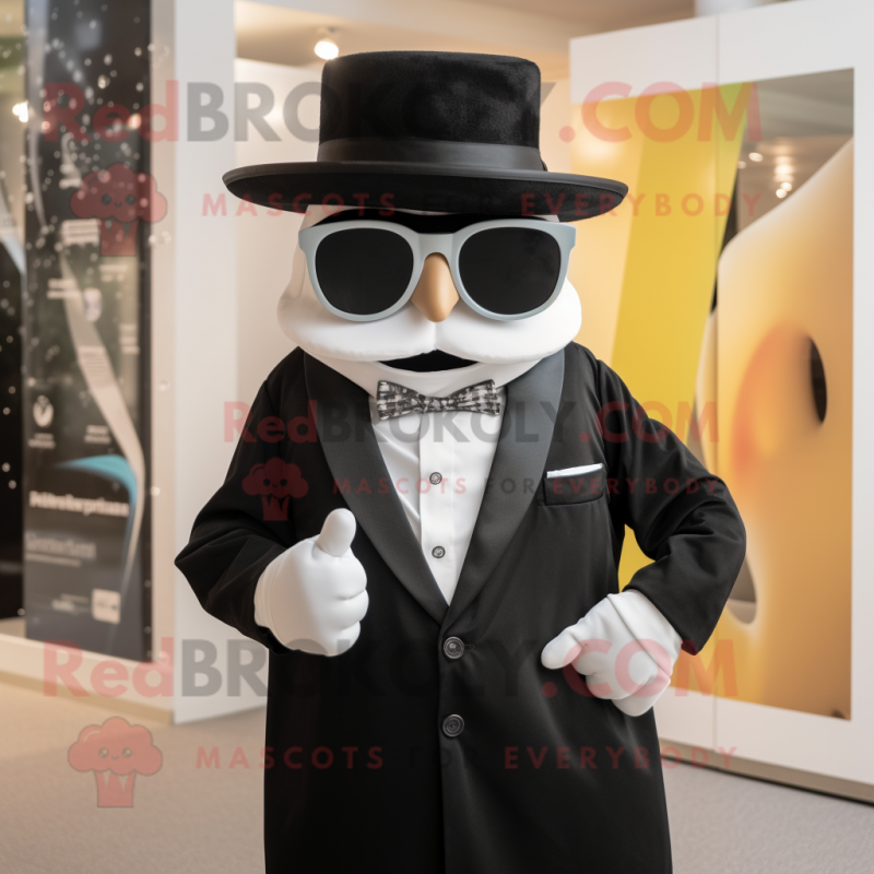 Black Gyro mascot costume character dressed with a Tuxedo and Sunglasses Black Gyro mascot costume character dressed with a Tuxedo and Sunglasses