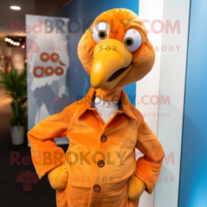 Orange Dodo Bird mascot costume character dressed with a Dress Shirt and Lapel pins