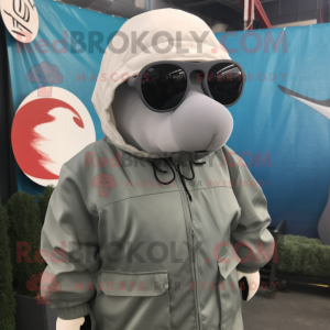 Gray Beluga Whale mascot costume character dressed with a Parka and Sunglasses