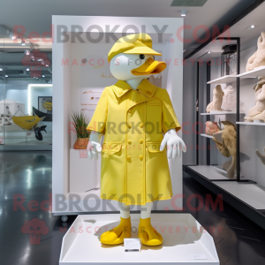 Lemon Yellow Muscovy Duck mascot costume character dressed with a Playsuit and Hat pins