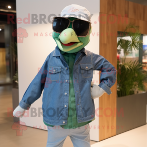 Green Goose mascot costume character dressed with a Chambray Shirt and Sunglasses