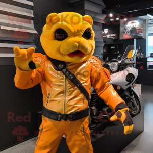 Gold Goldfish mascot costume character dressed with a Moto Jacket and Gloves