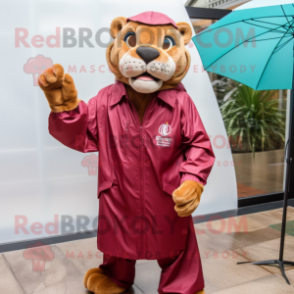 Maroon Mountain Lion mascot costume character dressed with a Raincoat and Cufflinks