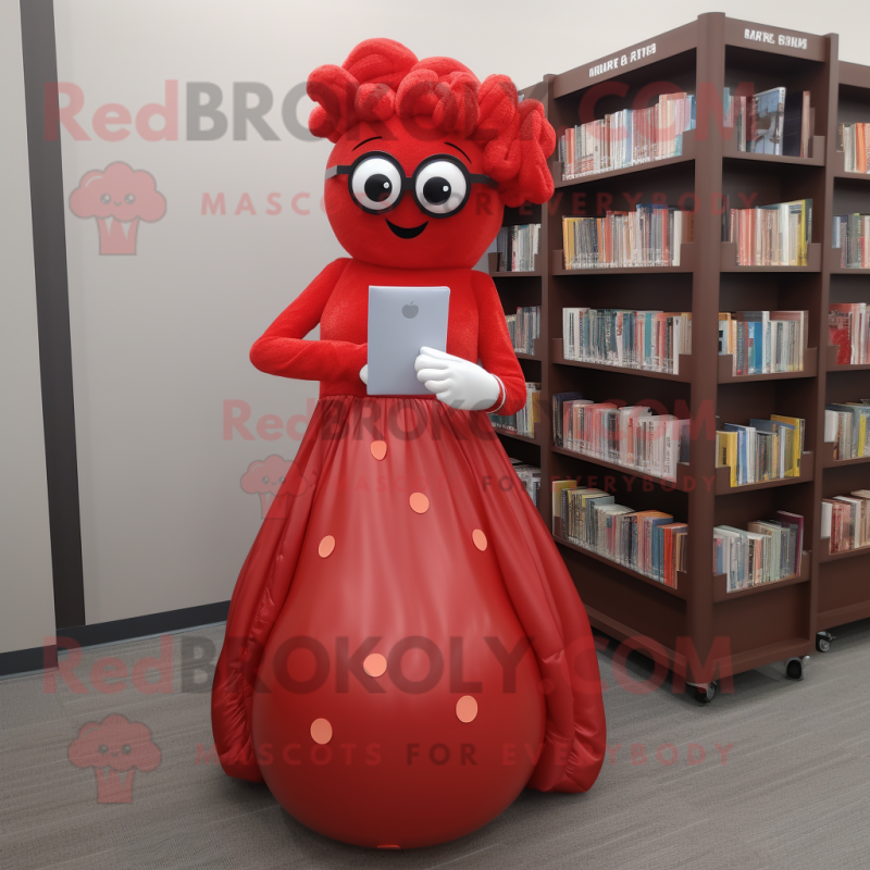Red Meatballs mascot costume character dressed with a Ball Gown and Reading glasses Red Meatballs mascot costume character dressed with a Ball Gown and Reading glasses