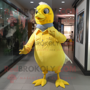 Yellow Pigeon mascot costume character dressed with a Flare Jeans and Wraps