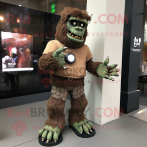 Brown Frankenstein'S Monster mascot costume character dressed with a Long Sleeve Tee and Bracelet watches