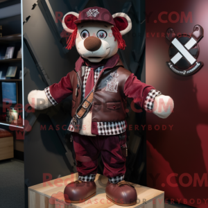 Maroon Celtic Cross mascot...