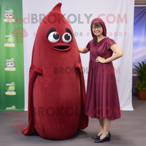 Maroon Zucchini mascot costume character dressed with a Wrap Dress and Wraps