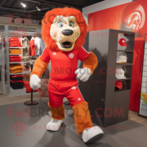 Red Tamer Lion mascot costume character dressed with a Running Shorts and Shoe laces