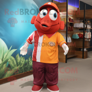 Maroon Clown Fish mascot costume character dressed with a Polo Shirt and Tie pins