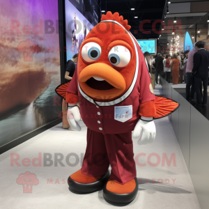 Maroon Clown Fish mascot costume character dressed with a Polo Shirt and Tie pins