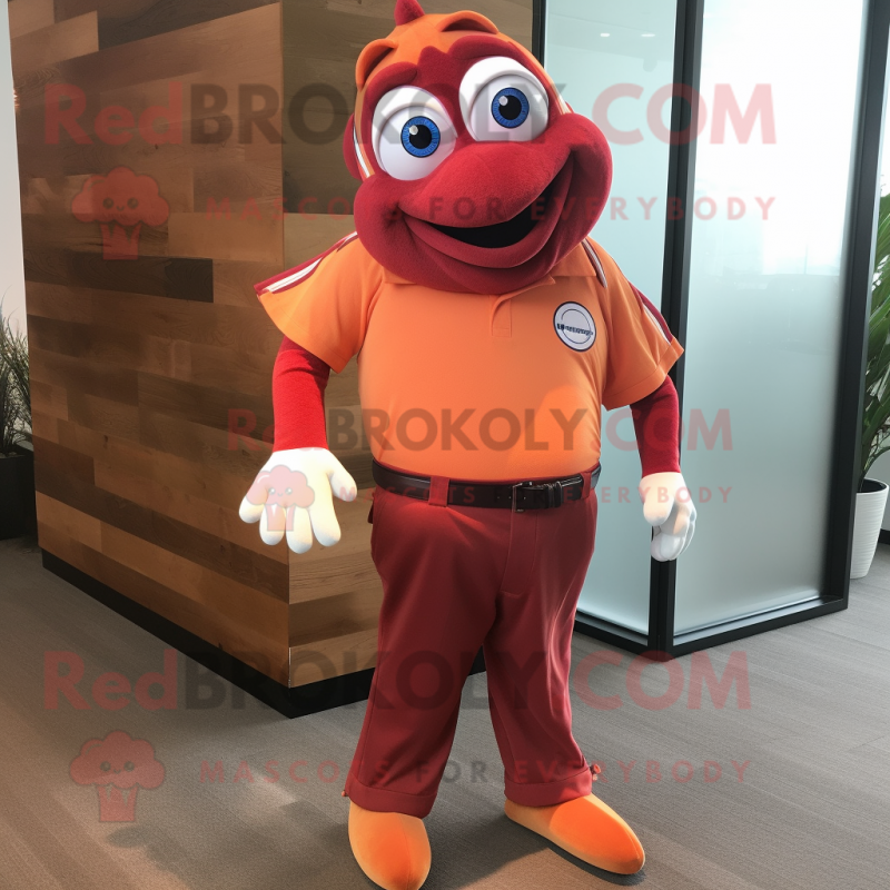 Maroon Clown Fish mascot costume character dressed with a Polo Shirt and Tie pins Maroon Clown Fish mascot costume character dressed with a Polo Shirt and Tie pins