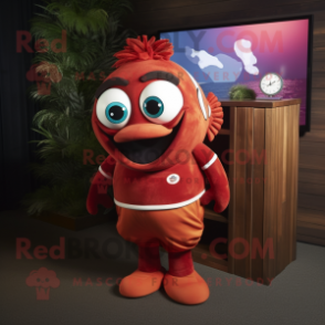 Maroon Clown Fish mascot costume character dressed with a Polo Shirt and Tie pins
