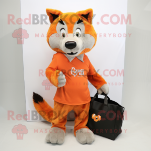 Orange Say Wolf mascot costume character dressed with a Trousers and Tote bags