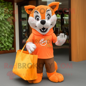 Orange Say Wolf mascot costume character dressed with a Trousers and Tote bags