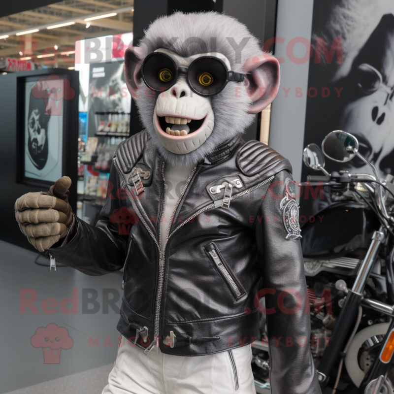 Silver Monkey mascot costume character dressed with a Biker Jacket and Foot pads