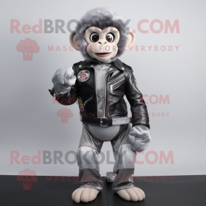 Silver Monkey mascot costume character dressed with a Biker Jacket and Foot pads