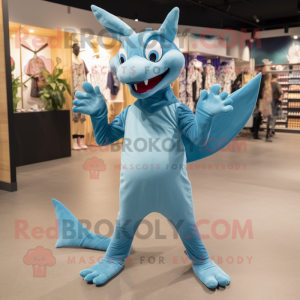 Sky Blue Pterodactyl mascot costume character dressed with a Joggers and Gloves