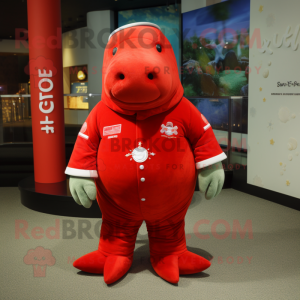 Red Stellar'S Sea Cow mascot costume character dressed with a Polo Shirt and Shoe clips