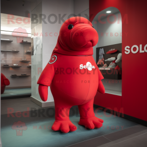 Red Stellar'S Sea Cow mascot costume character dressed with a Polo Shirt and Shoe clips