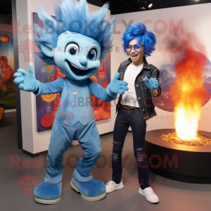 Blue Fire Eater mascot costume character dressed with a Flare Jeans and Watches