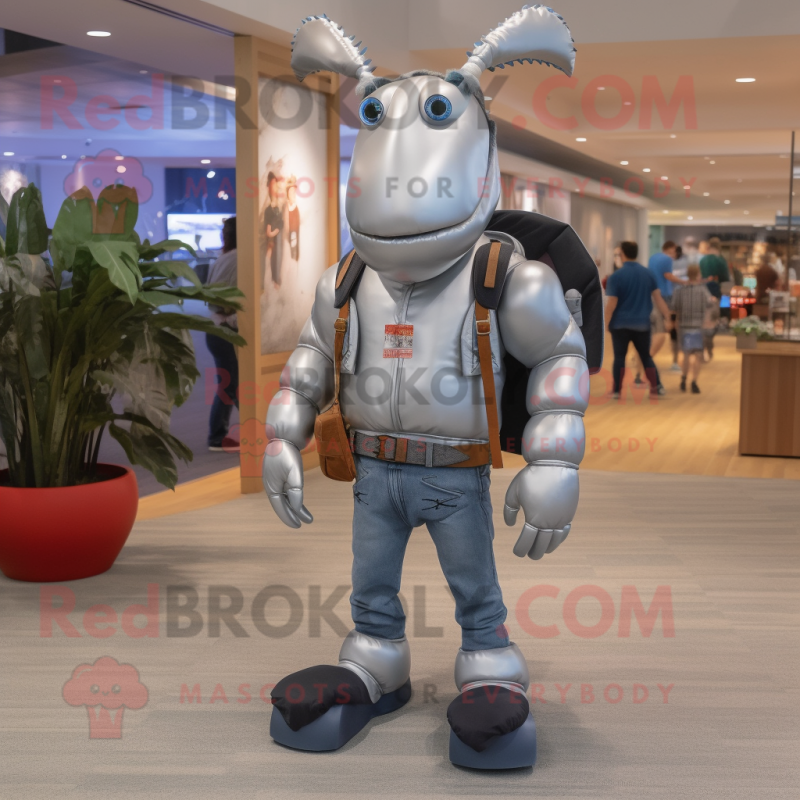 Silver Lobster mascot costume character dressed with a Bootcut Jeans and Backpacks