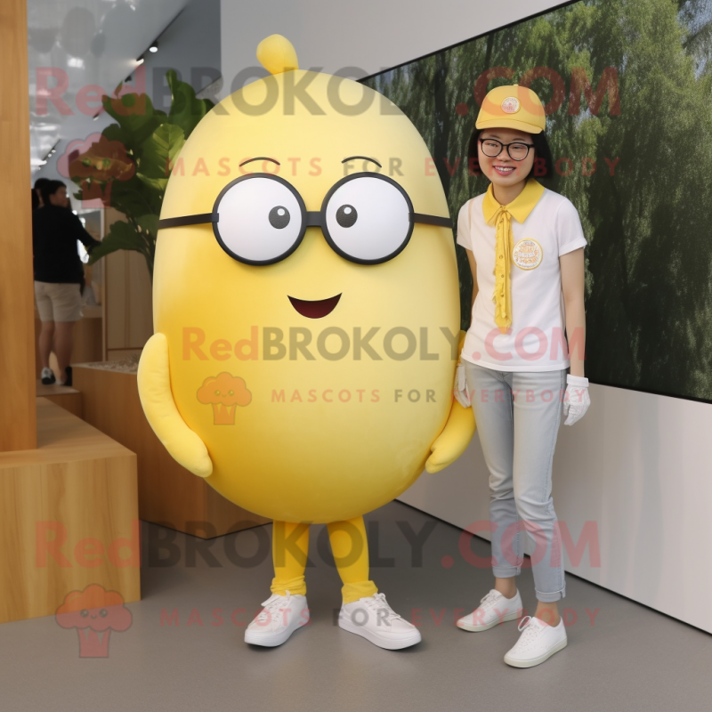 Lemon Yellow Apricot mascot costume character dressed with a Henley Tee and Eyeglasses