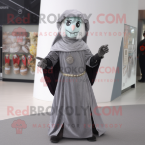 Silver Witch mascot costume character dressed with a Overalls and Scarf clips