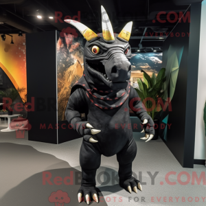 Svart Triceratops maskot...