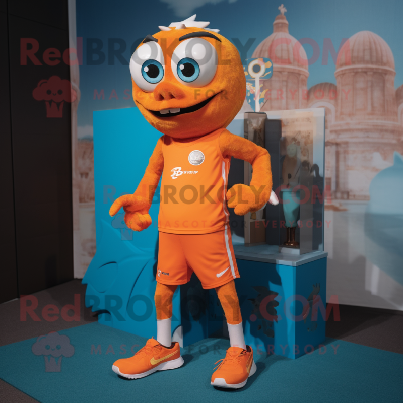 Orange Barracuda mascot costume character dressed with a Running Shorts and Shoe laces