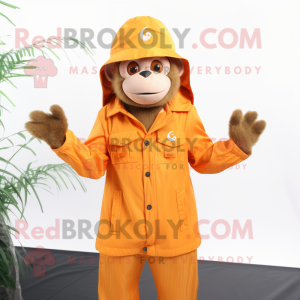 Orange Capuchin Monkey mascot costume character dressed with a Raincoat and Caps