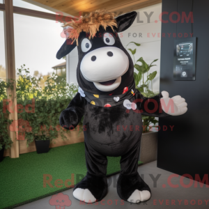 Sort Guernsey Cow maskot...